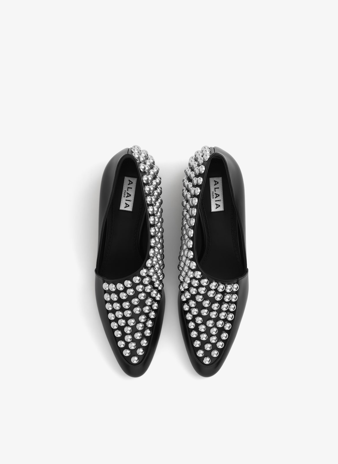 ASYMETRIC LOAFERS IN GLOSSY CALFSKIN WITH STUDS ALAÏA BLACK ASYMETRIC LOAFERS IN GLOSSY CALFSKIN WITH STUDS